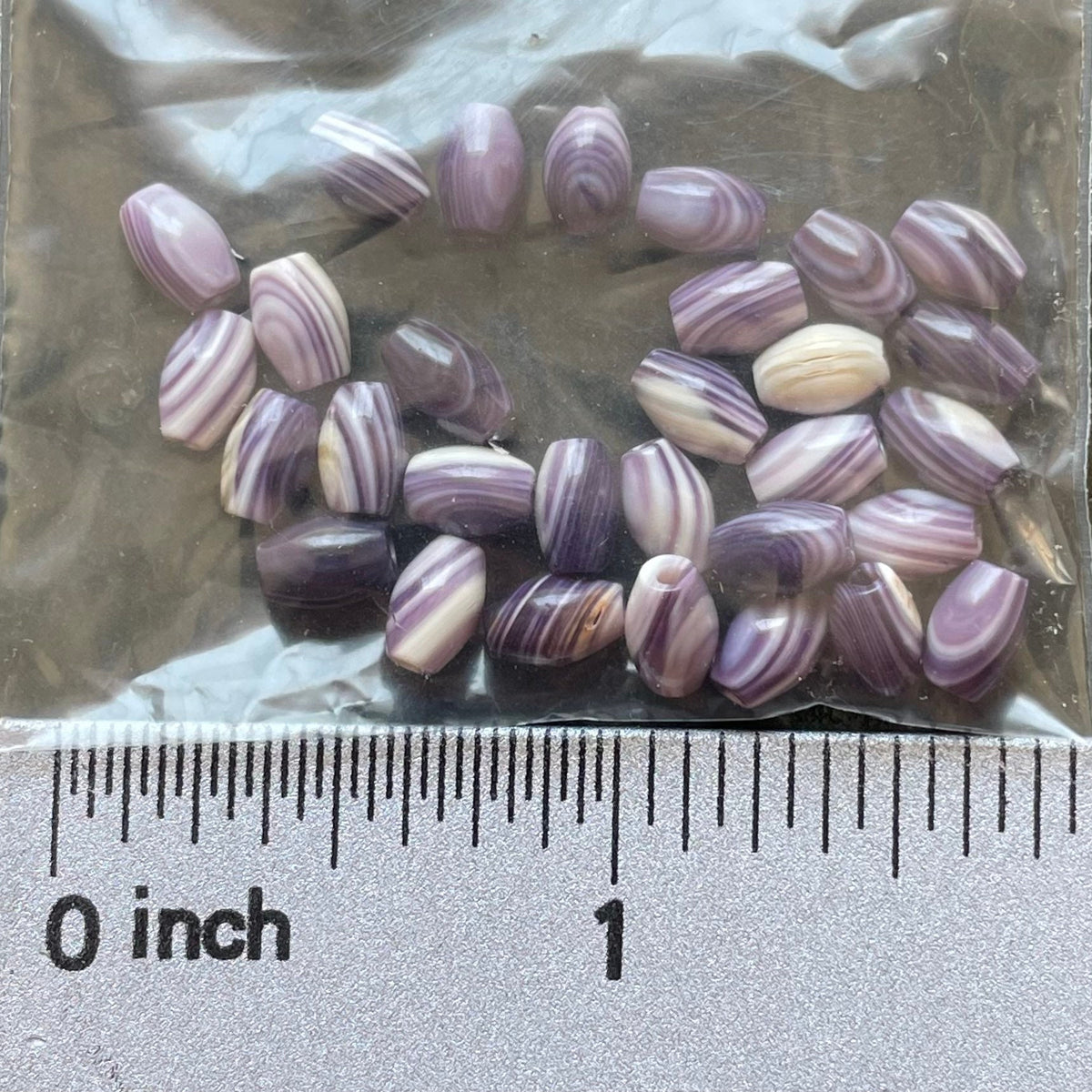 5021 rice 6x4mm purple wampum