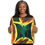 Teal Butterfly — unique person holding canvas