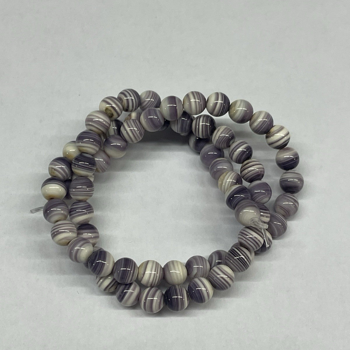 5063 Round 6mm purple wampum