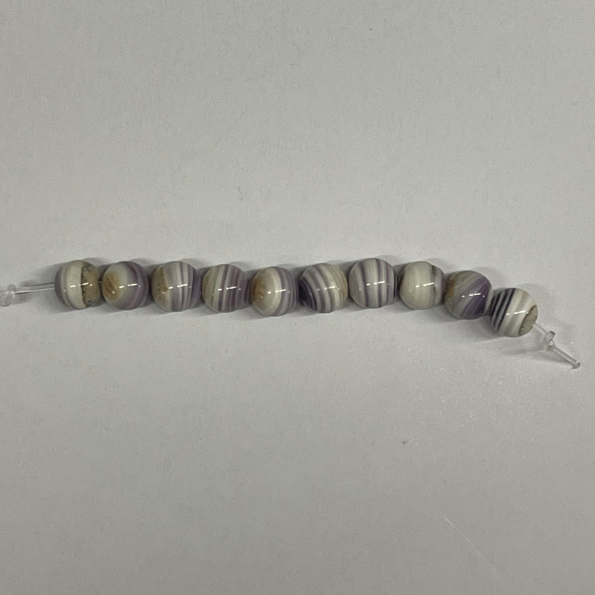 5063 Round 6mm purple wampum